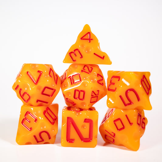 these dice are cheesy fun themed resin cheddar dungeons and dragons (aka dnd or d&d) game dice set, including a d20, d12, d10, d8, d6, and d4