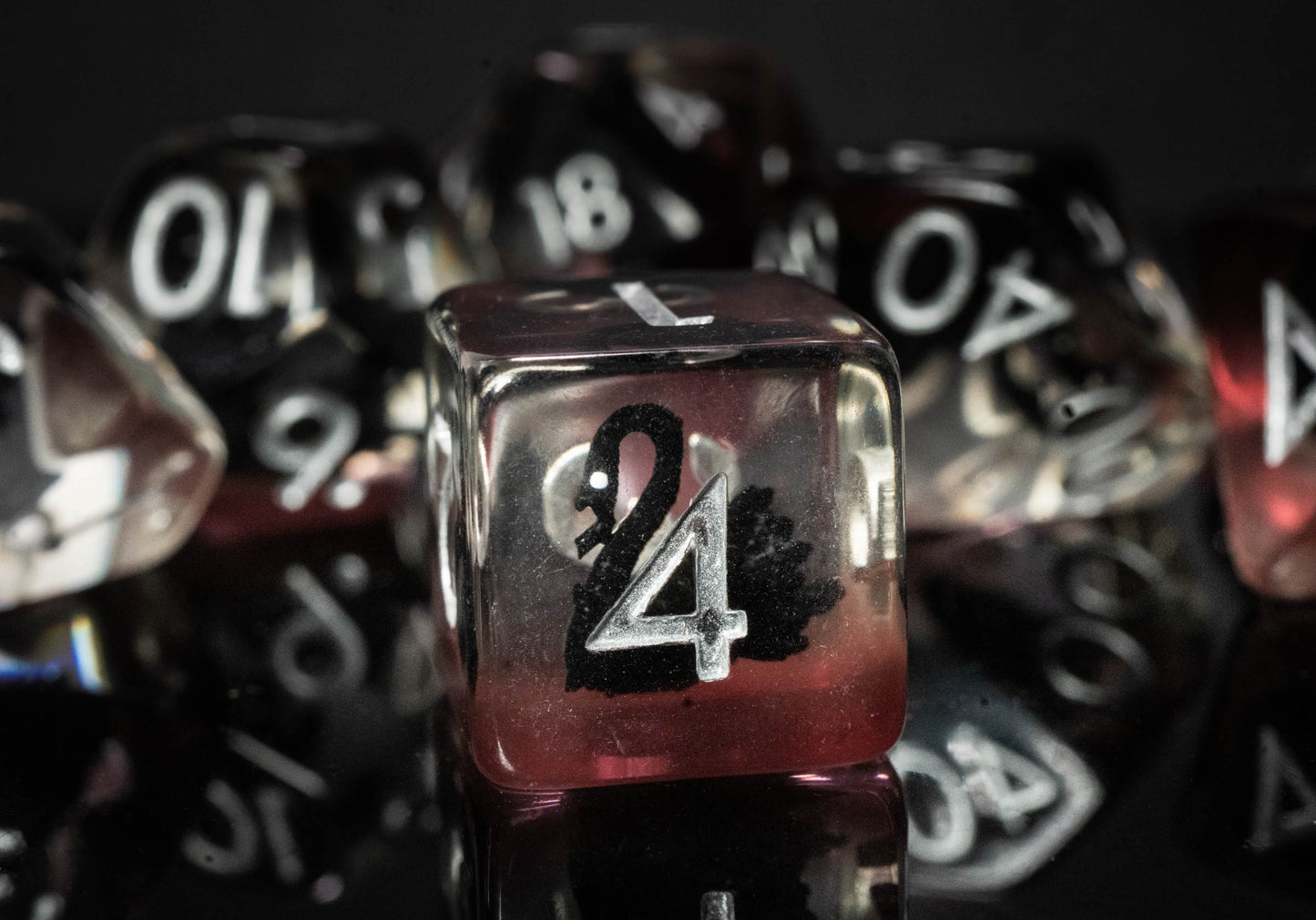 mystery resin with embedded shapes dungeons and dragons (aka dnd or d&d) game dice set, including a d20, d12, d10, d8, d6, and d4