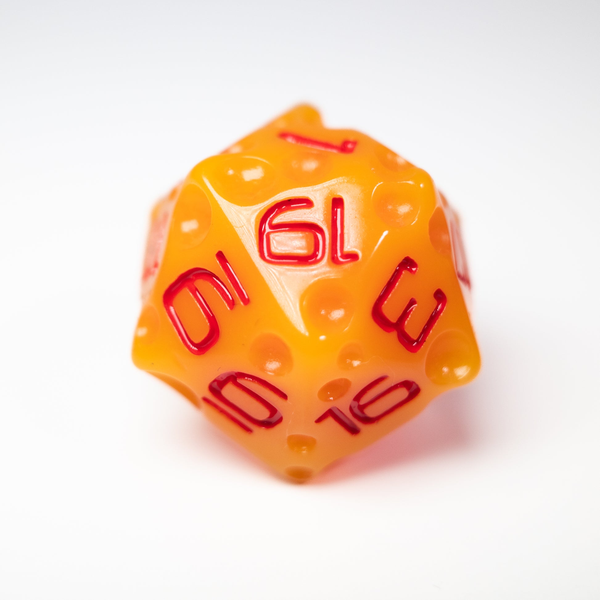 these dice are cheesy fun themed resin cheddar dungeons and dragons (aka dnd or d&d) game dice set, including a d20, d12, d10, d8, d6, and d4