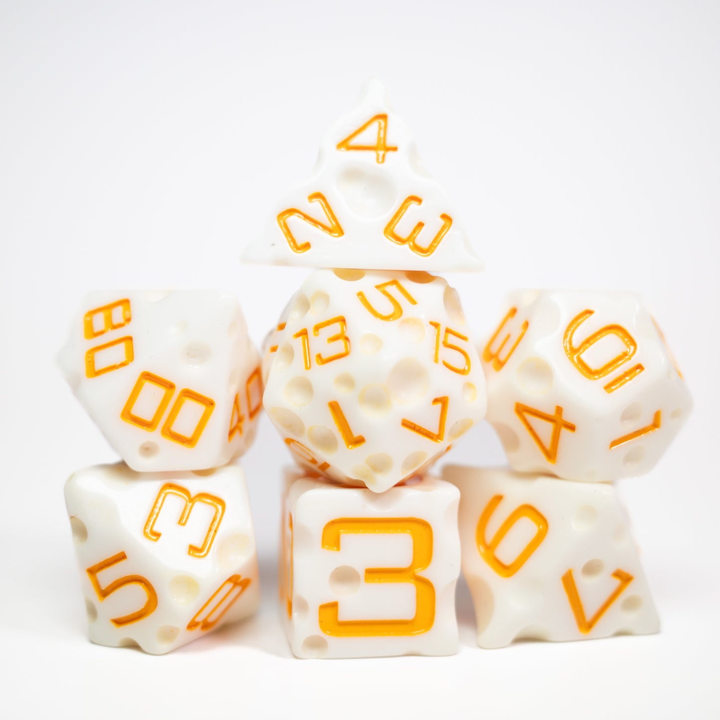 these dice are cheesy fun themed resin mozzarella dungeons and dragons (aka dnd or d&d) game dice set, including a d20, d12, d10, d8, d6, and d4