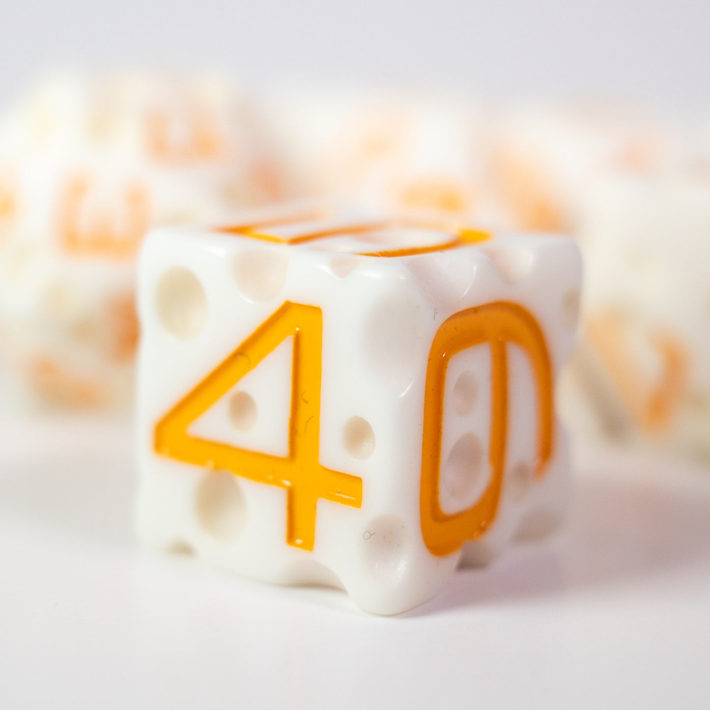 these dice are cheesy fun themed resin mozzarella dungeons and dragons (aka dnd or d&d) game dice set, including a d20, d12, d10, d8, d6, and d4