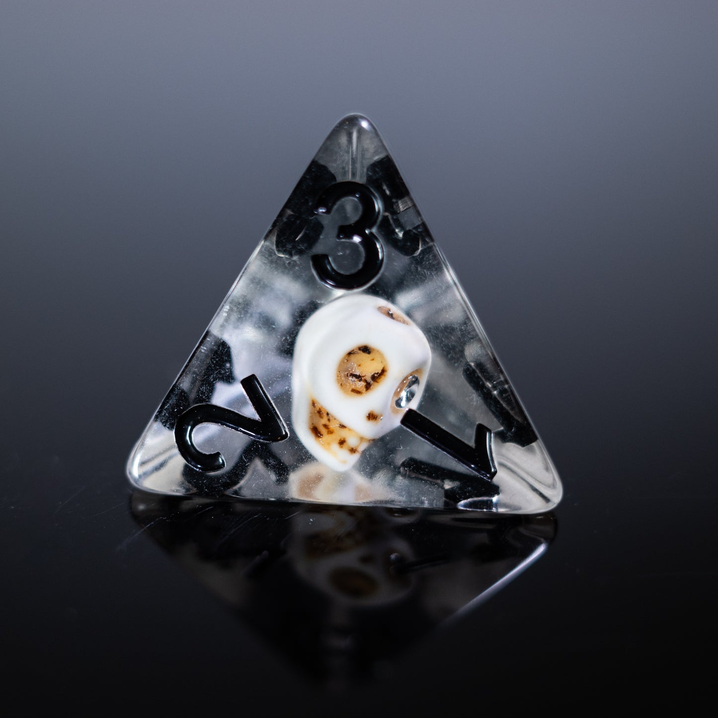 cursed resin skull design dungeons and dragons (aka dnd or d&d) game dice set, including a d20, d12, d10, d8, d6, and d4