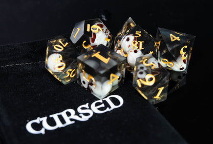 cursed black sharp edge resin skull design dungeons and dragons (aka dnd or d&d) game dice set, including a d20, d12, d10, d8, d6, and d4
