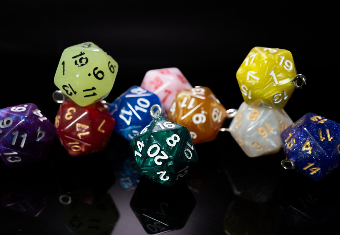set of dungeons and dragons (aka dnd or d&d) d20 twenty sided game dice, converted into hanging ornaments or keychains
