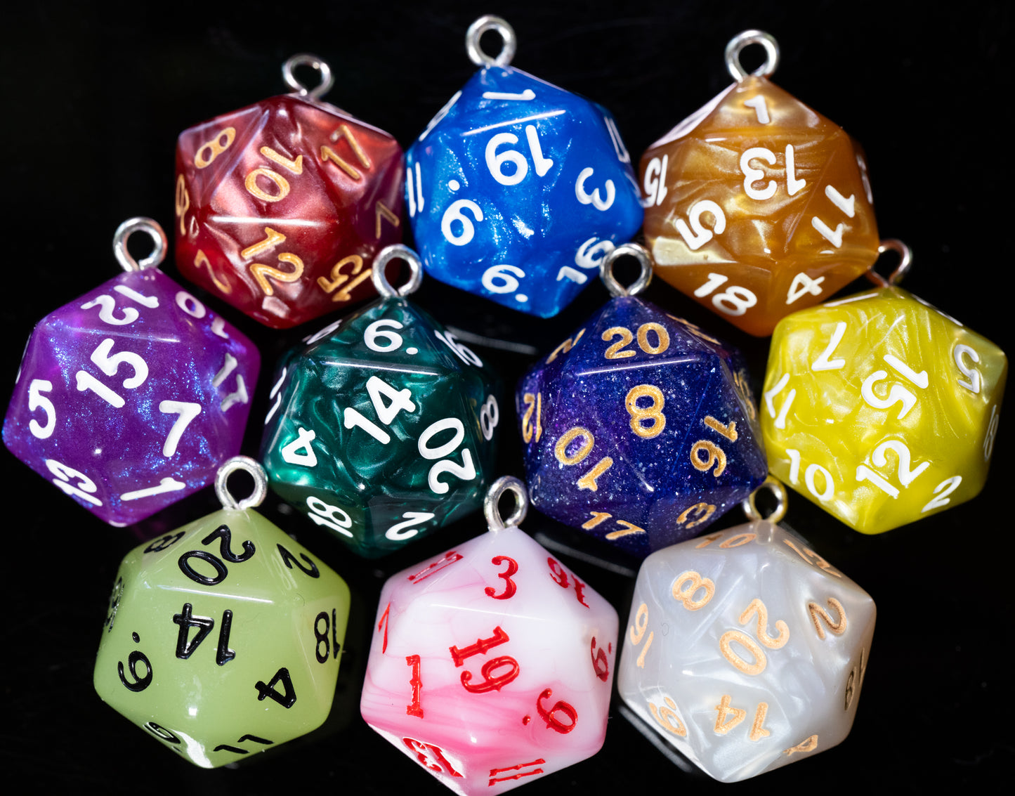 set of dungeons and dragons (aka dnd or d&d) d20 twenty sided game dice, converted into hanging ornaments or keychains