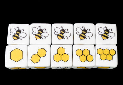 Set of d6 six sided dice with bees and honeycombs on a black background for Yahtzee and other dice games