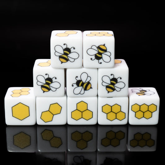 Set of d6 six sided dice with bees and honeycombs on a black background for Yahtzee and other dice games