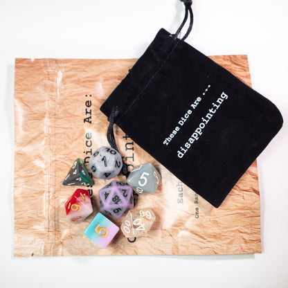 disappointing acrylic dungeons and dragons (aka dnd or d&d) game dice set, including a d20, d12, d10, d8, d6, and d4
