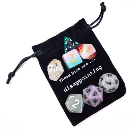 disappointing acrylic dungeons and dragons (aka dnd or d&d) game dice set, including a d20, d12, d10, d8, d6, and d4
