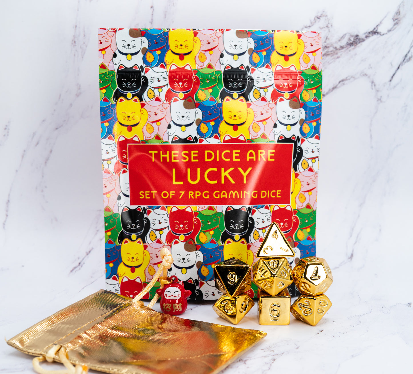 these dice are lucky golden acrylic maneki Neko lucky cat dungeons and dragons (aka dnd or d&d) game dice set, including a d20, d12, d10, d8, d6, and d4