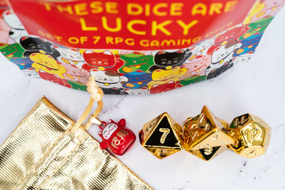 these dice are lucky golden acrylic maneki Neko lucky cat dungeons and dragons (aka dnd or d&d) game dice set, including a d20, d12, d10, d8, d6, and d4