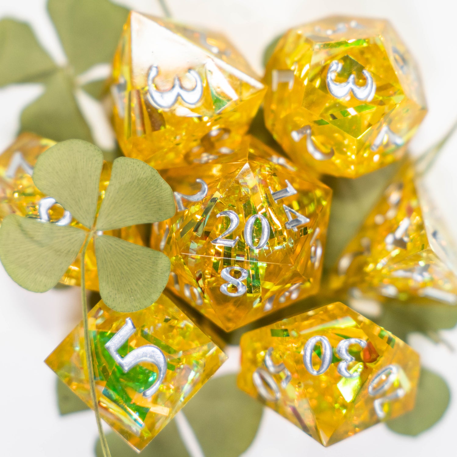 lucky glitter resin dungeons and dragons (aka dnd or d&d) game dice set, including 1d20, d12, d10, d8, d6, d4, with four leaf clovers
