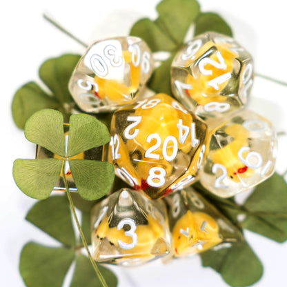 these dice are lucky resin duck dungeons and dragons (aka dnd or d&d) game dice set, including a d20, d12, d10, d8, d6, and d4