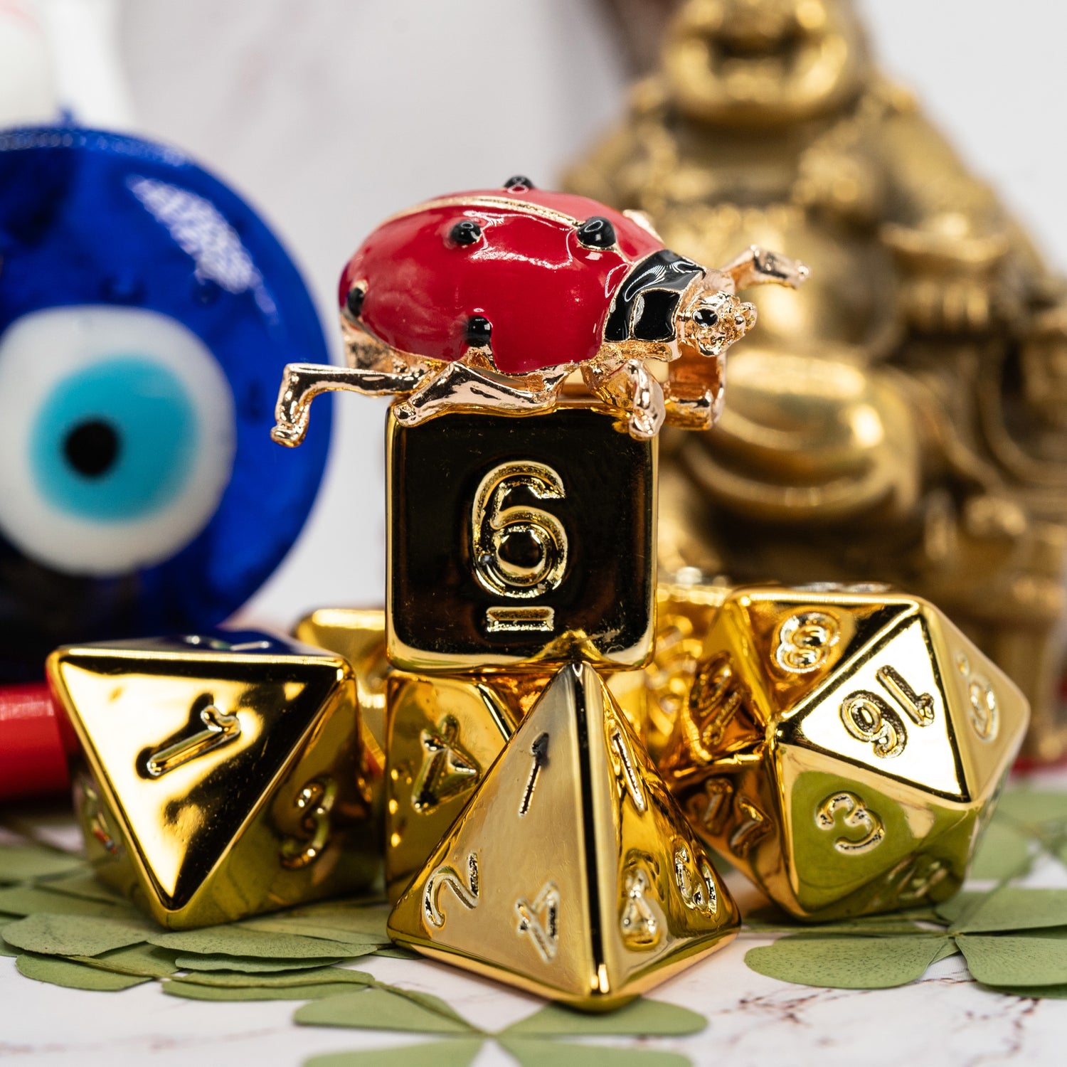 lucky golden dungeons and dragons (aka dnd or d&d) game dice set, including 1d20, d12, d10, d8, d6, d4, with a ladybug pin
