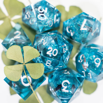 these dice are lucky sharp edge resin koi fish dungeons and dragons (aka dnd or d&d) game dice set, including a d20, d12, d10, d8, d6, and d4