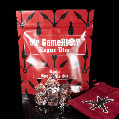 Rogue DND Dice Set – 7 Piece Red Resin Polyhedral RPG Dice with Embedded Throwing Knife Designs & Rogue Velvet Dice Bag | Fantasy TTRPG Dice for Pathfinder, Assassins, Thieves & Stealth Characters