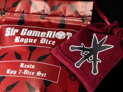 Rogue DND Dice Set – 7 Piece Red Resin Polyhedral RPG Dice with Embedded Throwing Knife Designs & Rogue Velvet Dice Bag | Fantasy TTRPG Dice for Pathfinder, Assassins, Thieves & Stealth Characters